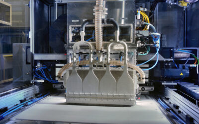 How Can Additive Manufacturing Realize the Promise of Production Scale?