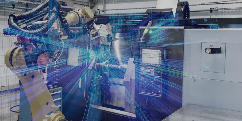 Robot arms on an industrial automation line where factory conditions are tracked for autonomous process control