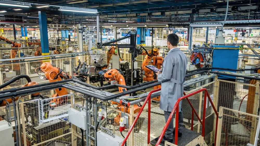 Robot arms and fixtured parts on a factory automation line supplying variables for process characterization